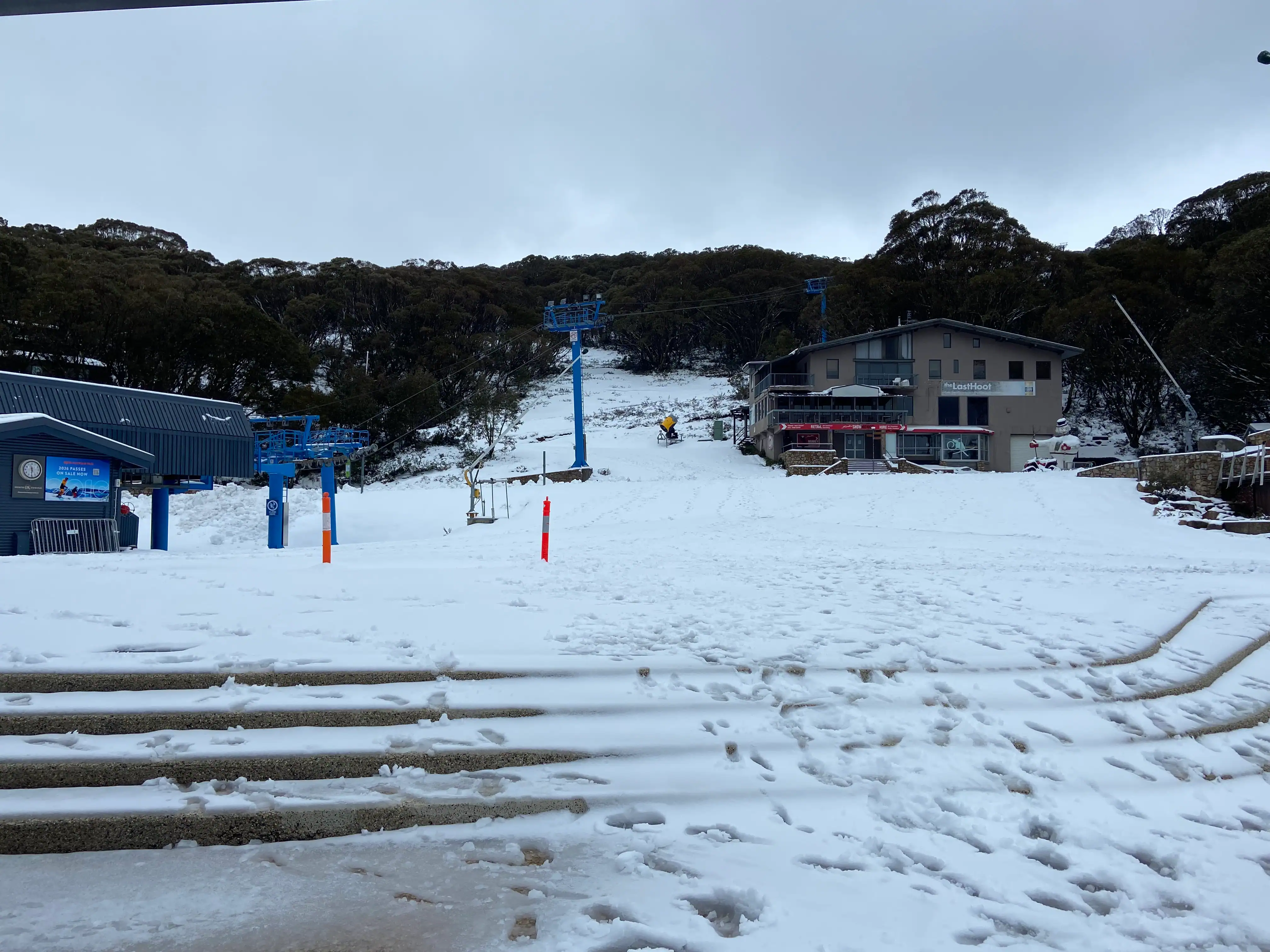 Looking across Slalom plaza at Falls creek on a snowy day