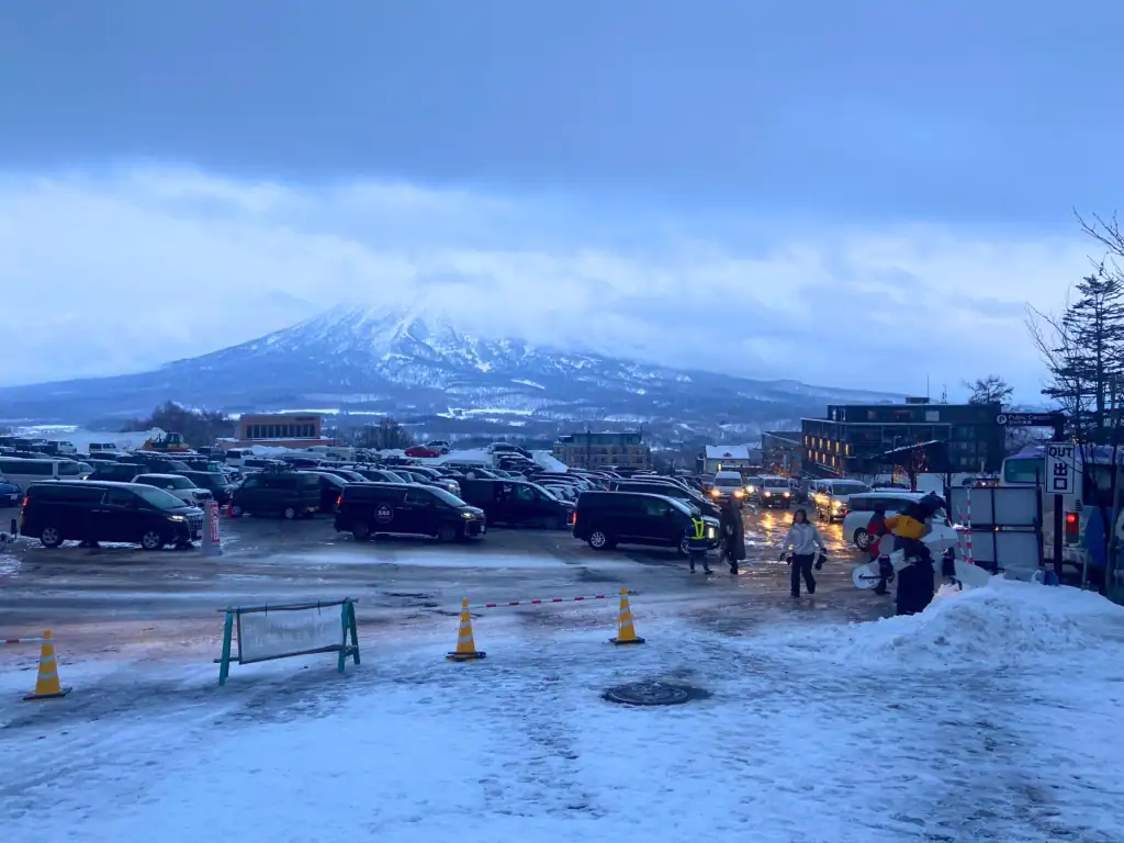 Mt Yotei towering over the Niseko Welcome Centre Carpark