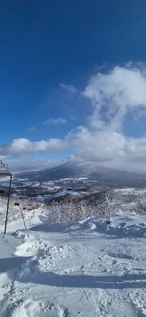 Looking down the slopes over fresh snow in Hanazono