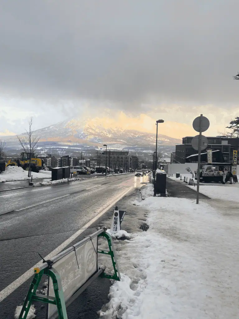 Looking down the street in Hirafu with Mt Yotei in the background